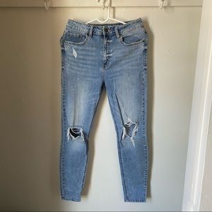 Light wash distressed skinny jeans